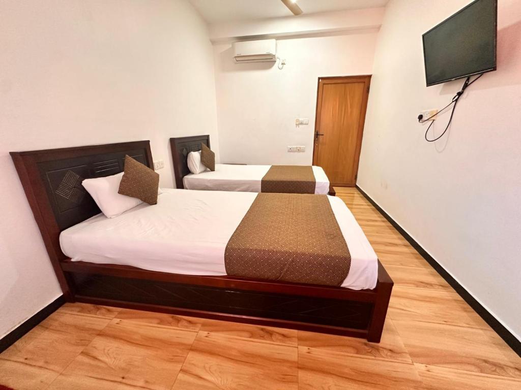 Postel nebo postele na pokoji v ubytování Holiday Villa