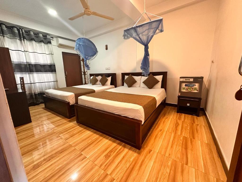 Postel nebo postele na pokoji v ubytování Holiday Villa