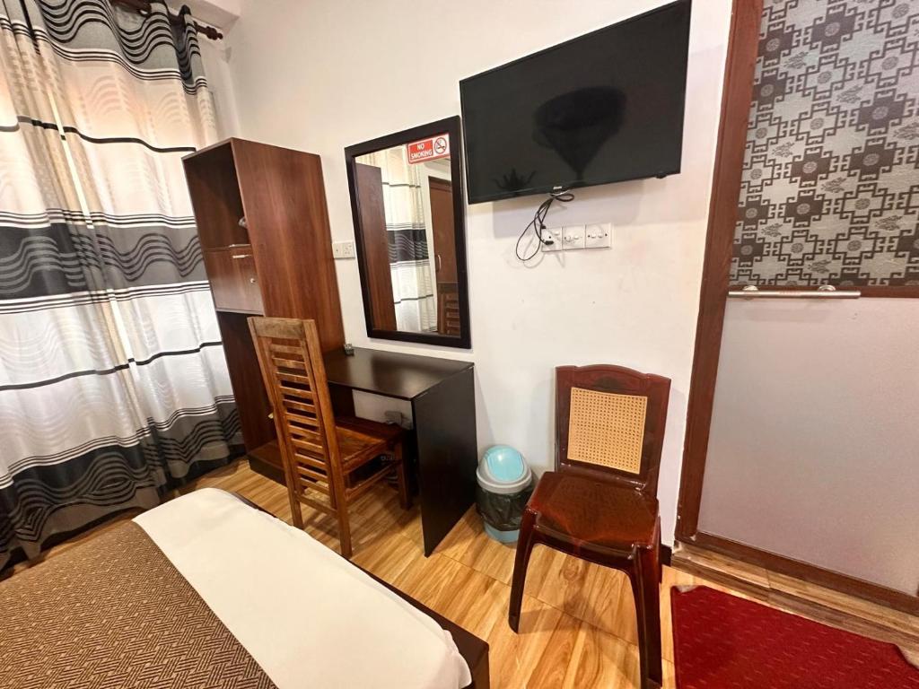 TV a/nebo společenská místnost v ubytování Holiday Villa