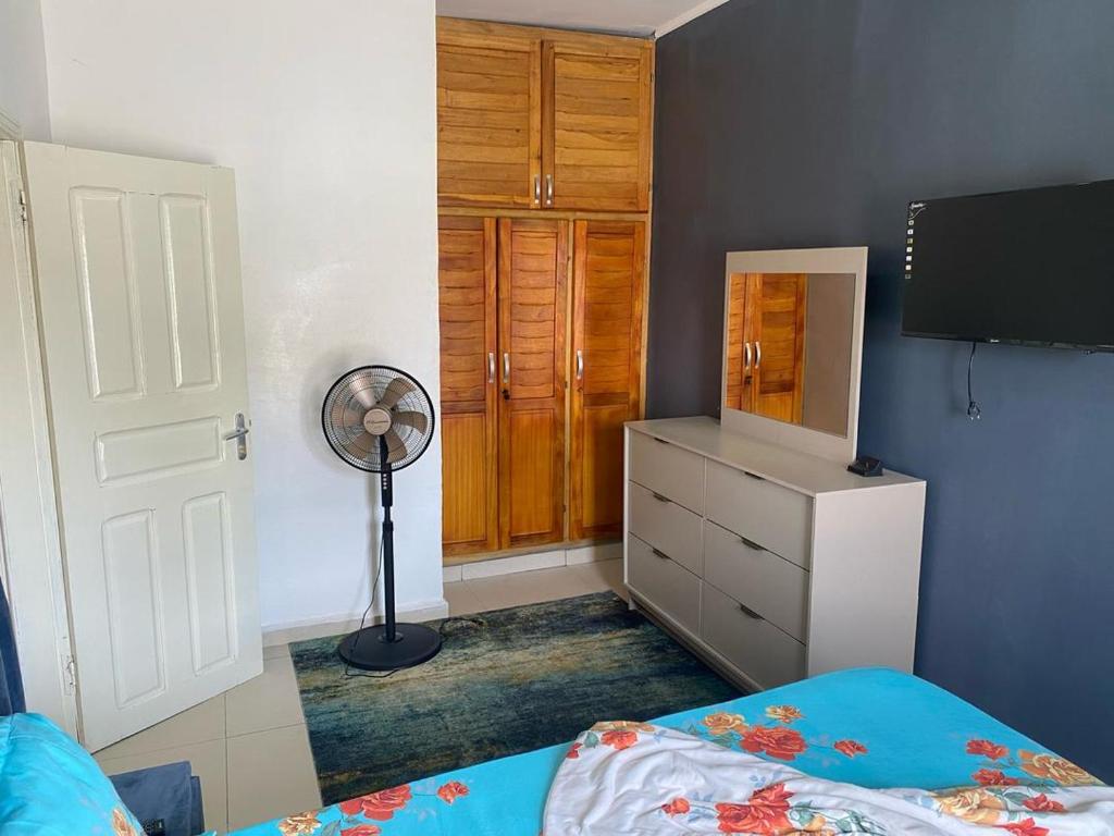 Llit o llits en una habitació de KOTTO meublé