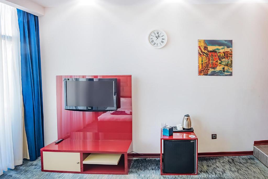 Postel nebo postele na pokoji v ubytování Denis hotel