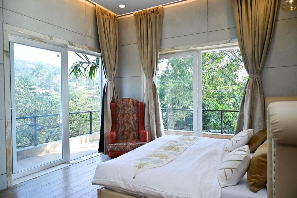 Кровать или кровати в номере Casa King & Casa Queen Villas