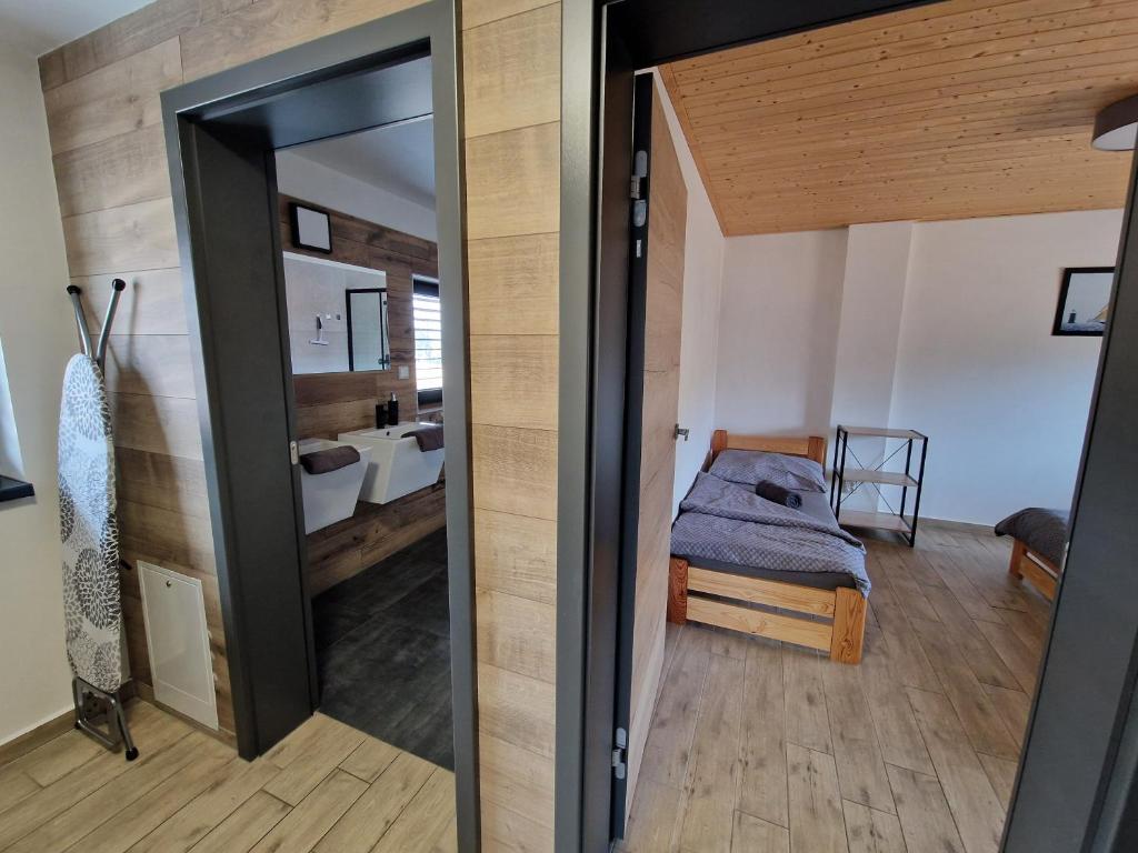 Postel nebo postele na pokoji v ubytování Relax Vila Lipno 2 u pláže Windy Point