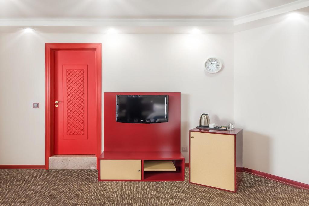 TV a/nebo společenská místnost v ubytování Denis hotel