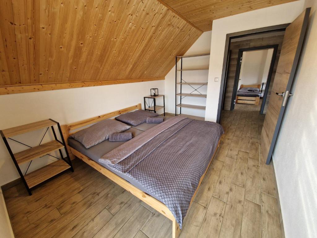 Postel nebo postele na pokoji v ubytování Relax Vila Lipno 2 u pláže Windy Point