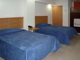 Postel nebo postele na pokoji v ubytování Hotel CEO