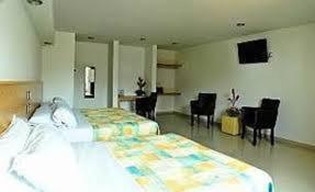 Postel nebo postele na pokoji v ubytování Hotel CEO