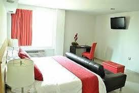 Postel nebo postele na pokoji v ubytování Hotel CEO