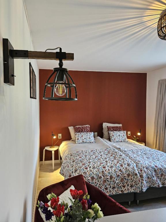 Postel nebo postele na pokoji v ubytování B&B it Arbeidershûske