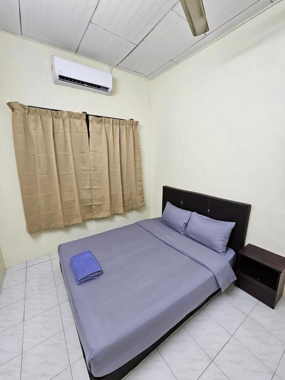 Postel nebo postele na pokoji v ubytování May Flower Hostel