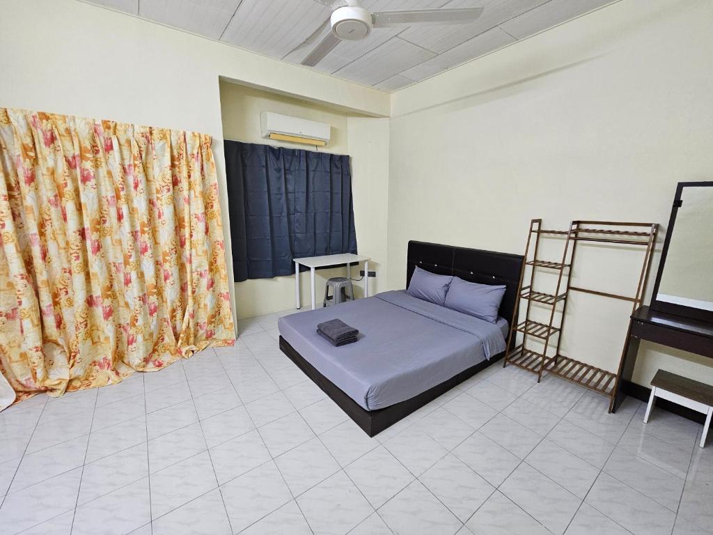 Postel nebo postele na pokoji v ubytování May Flower Hostel