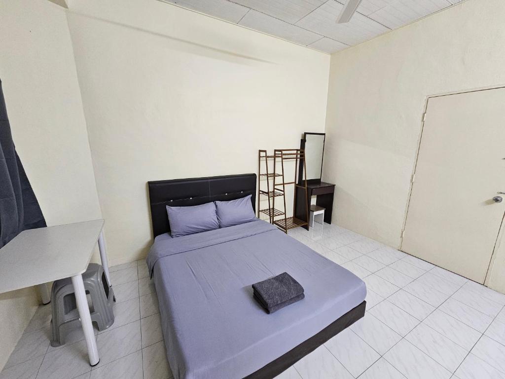 Postel nebo postele na pokoji v ubytování May Flower Hostel