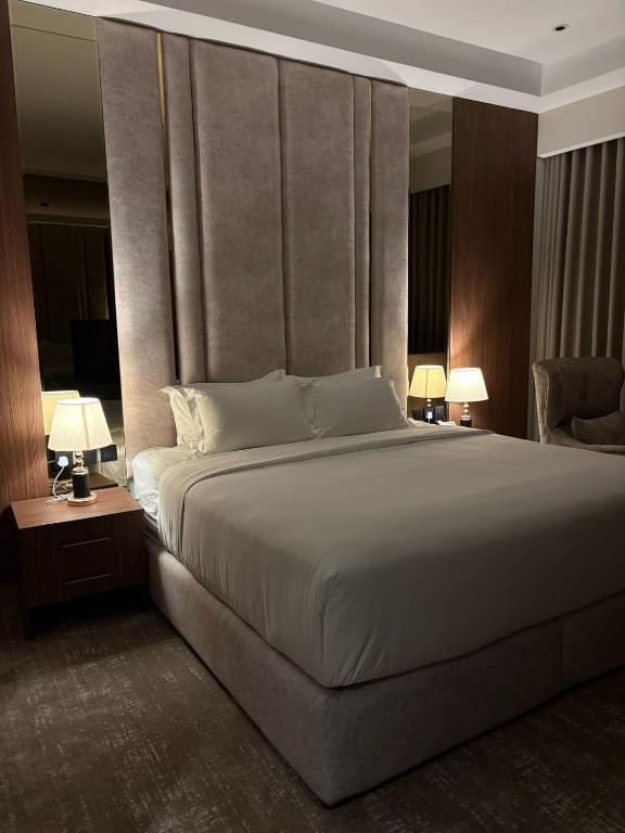 Postel nebo postele na pokoji v ubytování Doyof Hotel فندق ضيوف