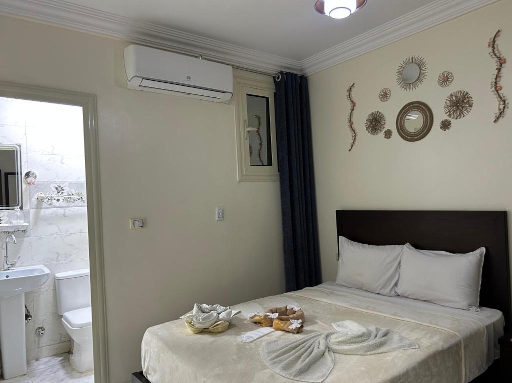 Postel nebo postele na pokoji v ubytování Giza Pyramids View Guest house
