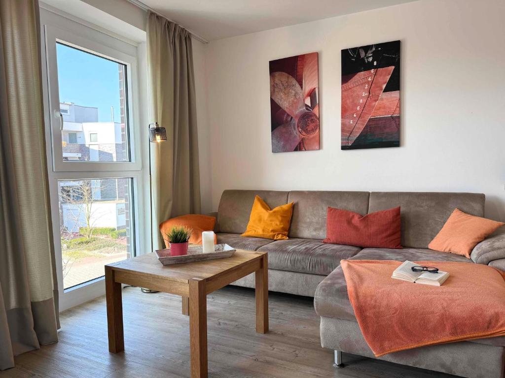 Χώρος καθιστικού στο Ferienwohnung de Roggenbloom