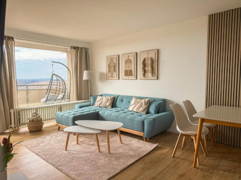 Et opholdsområde på Apartment Wolfswarte, Panorama, Sauna, Schwimmbad