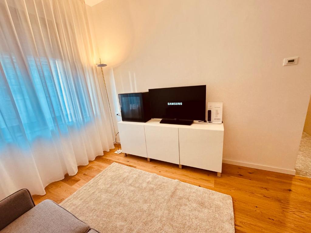 TV a/nebo společenská místnost v ubytování Hotel Pex Mantova