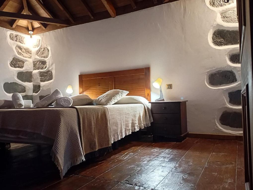 Ένα ή περισσότερα κρεβάτια σε δωμάτιο στο Casa Higa Tenerife