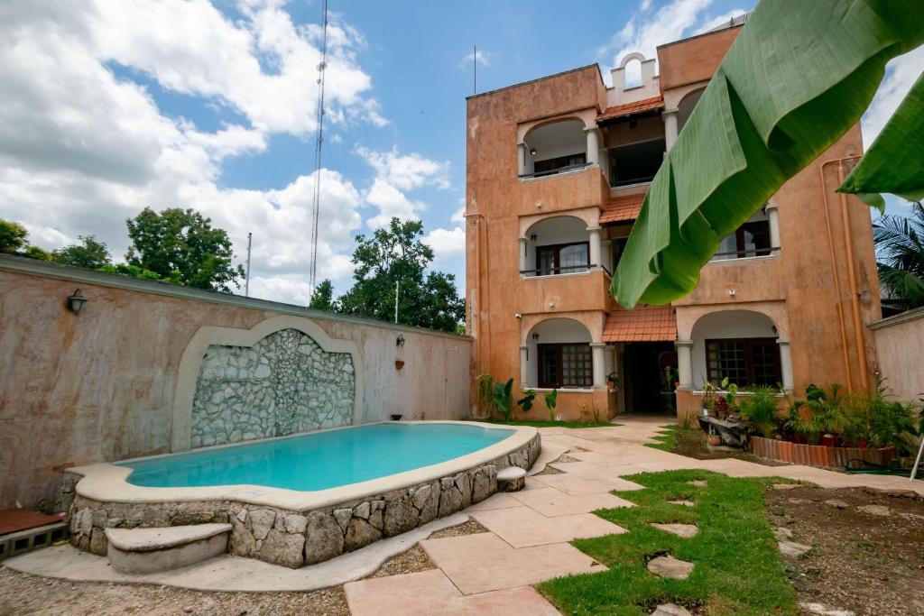 Bazén v ubytování Hotel Boutique Kiin Wayeb nebo v jeho okolí