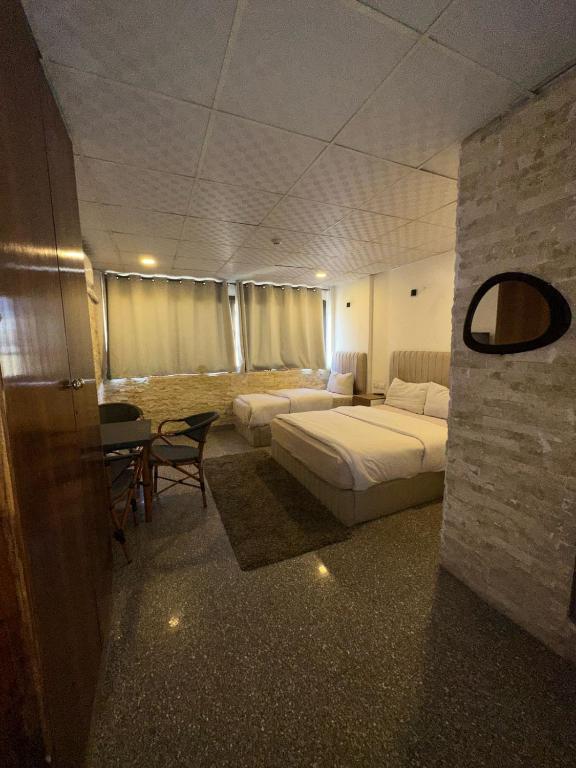 Postel nebo postele na pokoji v ubytování cairo jordan hotel