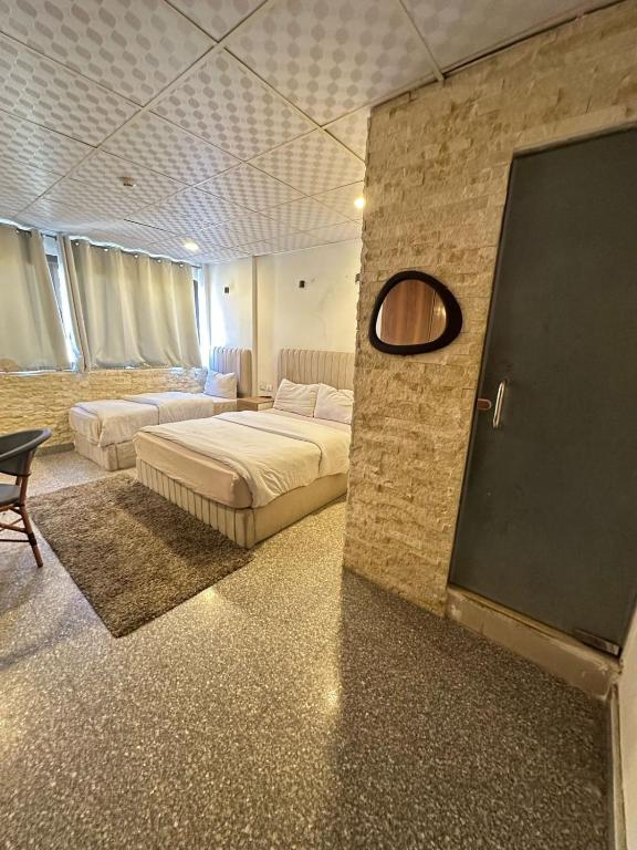 Postel nebo postele na pokoji v ubytování cairo jordan hotel