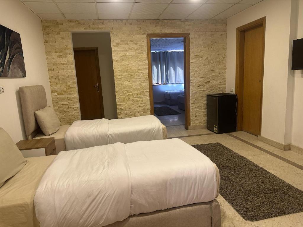 Postel nebo postele na pokoji v ubytování cairo jordan hotel