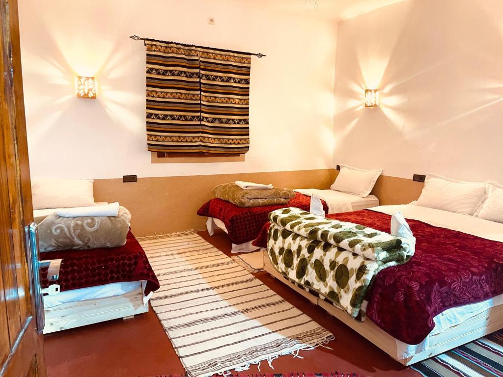 Postel nebo postele na pokoji v ubytování Auberge la belle vue dades