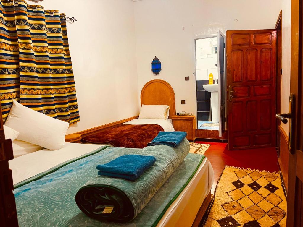 Postel nebo postele na pokoji v ubytování Auberge la belle vue dades