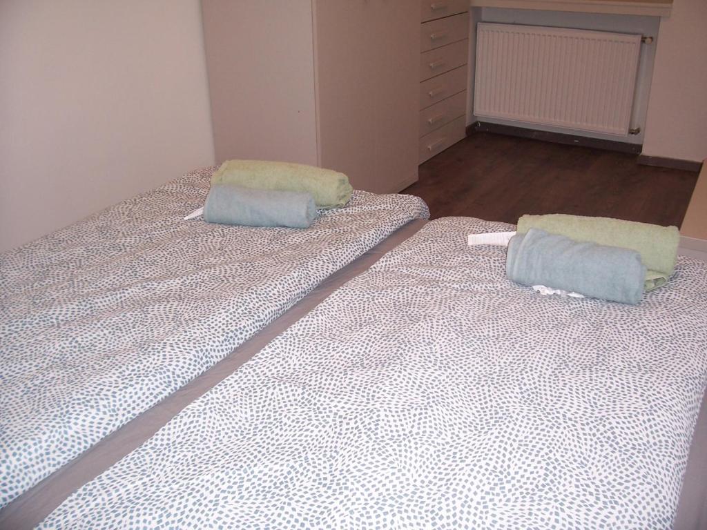 Postel nebo postele na pokoji v ubytování Trinity Apartment
