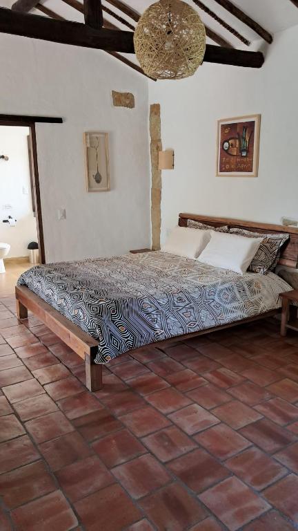 Postel nebo postele na pokoji v ubytování Casa Alamanda B&B