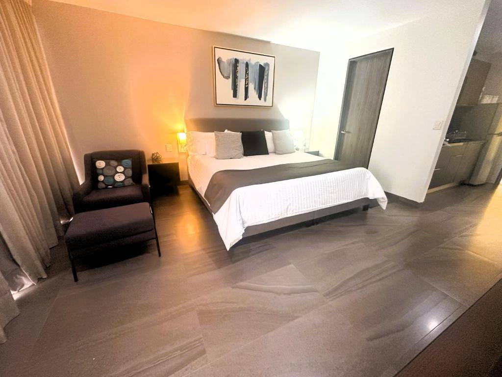 Postel nebo postele na pokoji v ubytování Arboleda 5 Luxury Lofts
