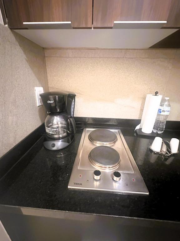 Kuchyň nebo kuchyňský kout v ubytování Arboleda 5 Luxury Lofts