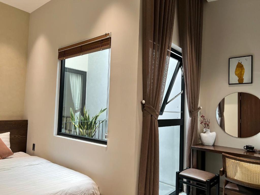 Postel nebo postele na pokoji v ubytování Ladyfit House