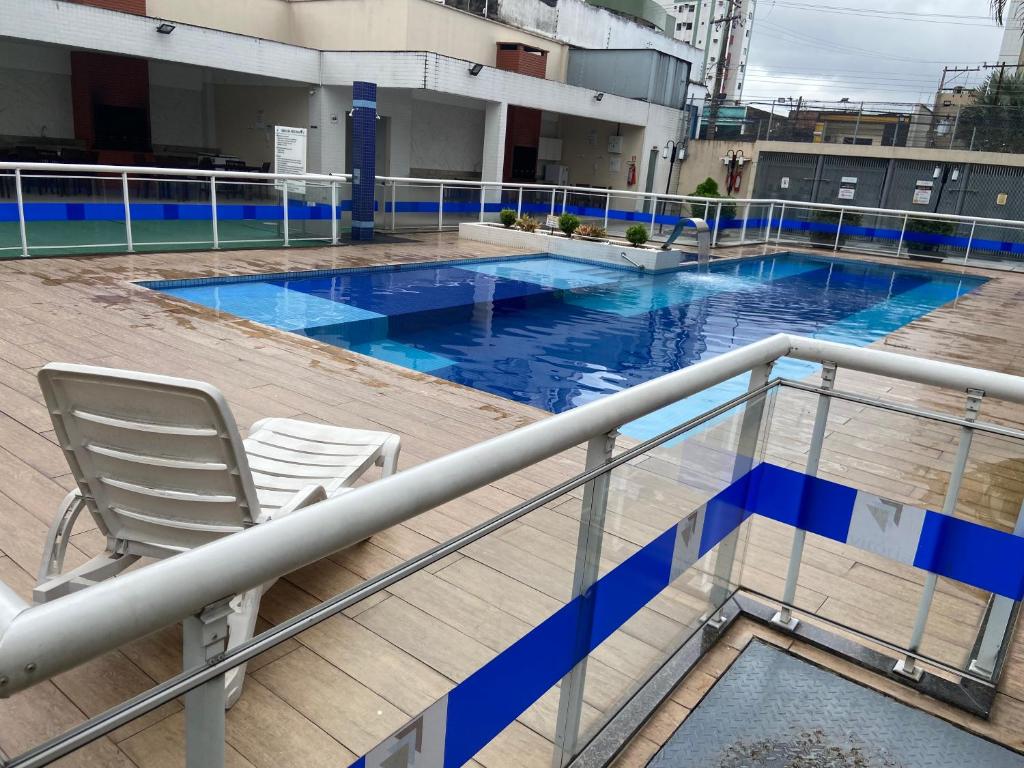 Bazén v ubytování Excelente apartamento na Pedreira localização estratégica nebo v jeho okolí