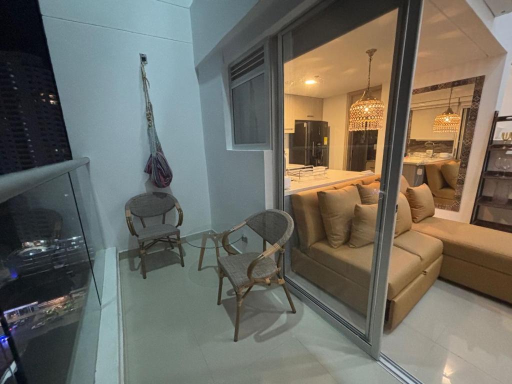 TV a/nebo společenská místnost v ubytování Apartamento Magno Loft Bocagrande