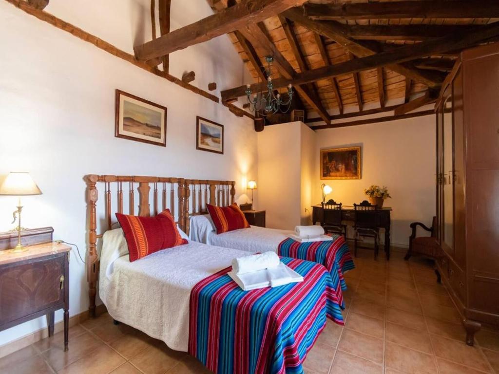 Posteľ alebo postele v izbe v ubytovaní Finca&Spa Vereda Real