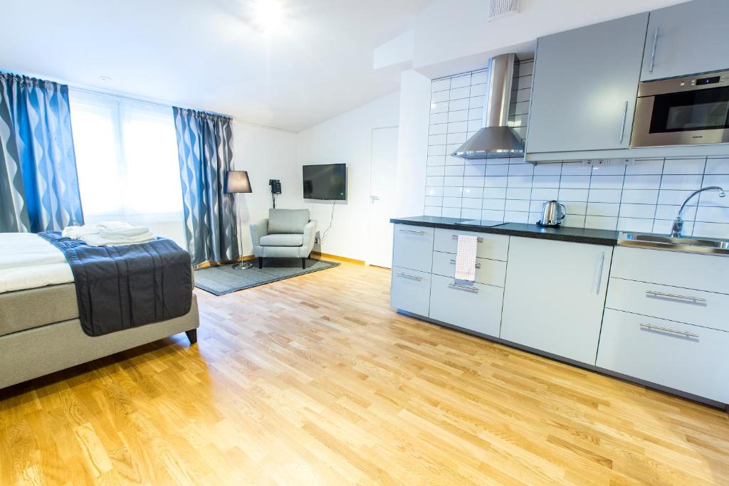 Kuchyň nebo kuchyňský kout v ubytování Simloc Hotel Drottninggatan