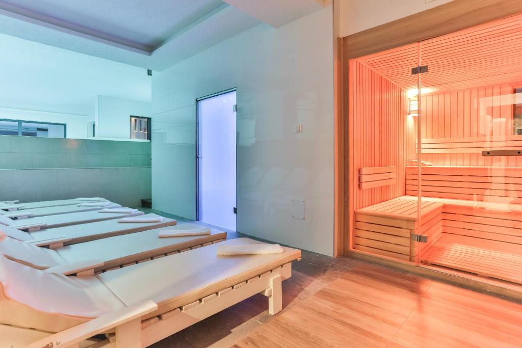 Postel nebo postele na pokoji v ubytování Hotel Bracera