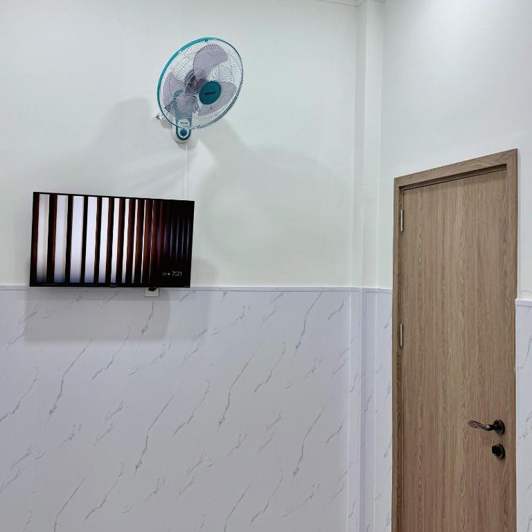 TV/trung tâm giải trí tại Nhà Nghỉ Phố Biển Phan Thiết