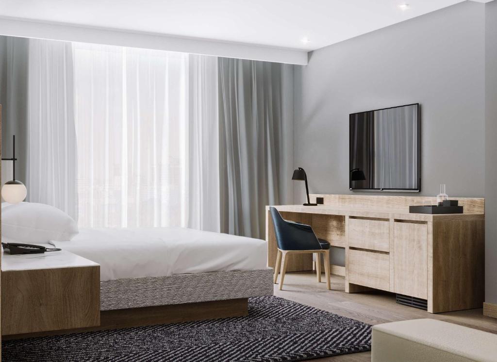 Postel nebo postele na pokoji v ubytování Hyatt House Nairobi Westlands