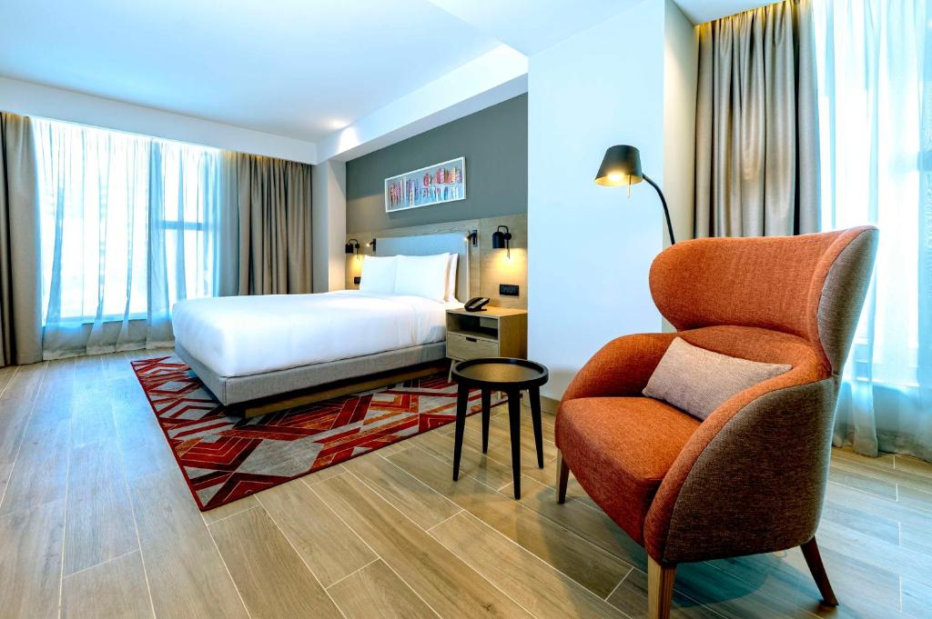 Postel nebo postele na pokoji v ubytování Hyatt House Nairobi Westlands