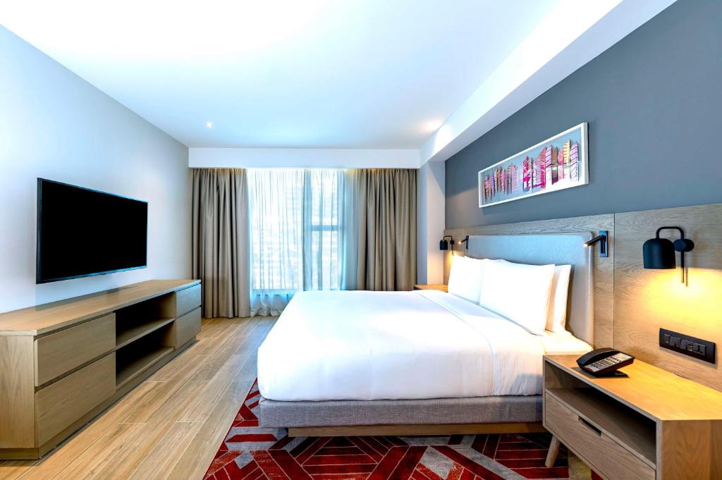 TV a/nebo společenská místnost v ubytování Hyatt House Nairobi Westlands