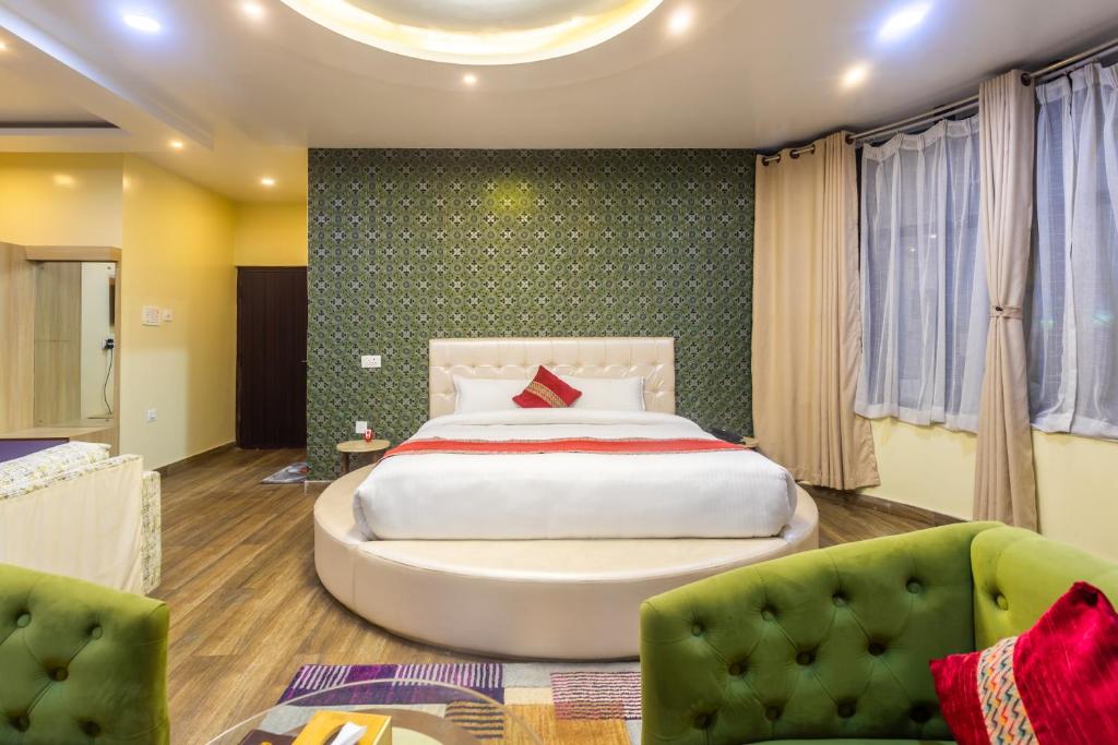 Postel nebo postele na pokoji v ubytování The SR Hotel