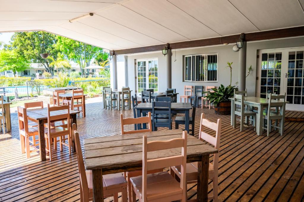 Restaurant ou autre lieu de restauration dans l'établissement Pine Lodge George