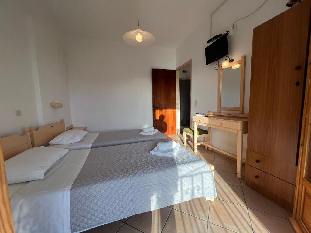 Postel nebo postele na pokoji v ubytování Villa Rebecca