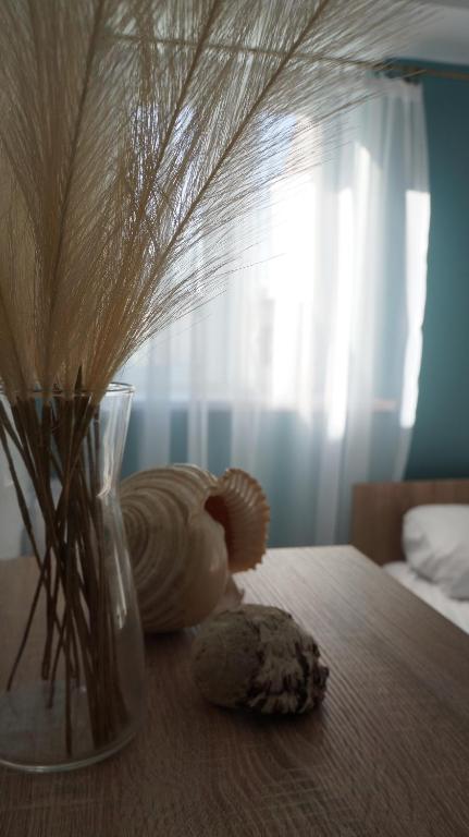 Postel nebo postele na pokoji v ubytování Jantar
