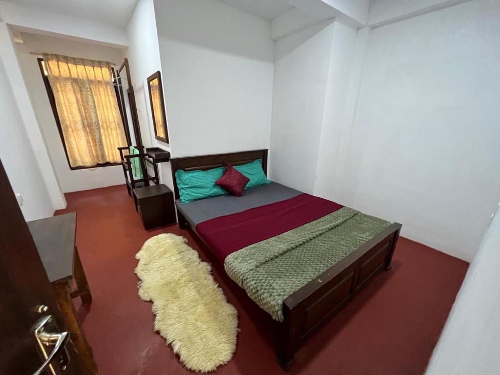 Postel nebo postele na pokoji v ubytování Moban House