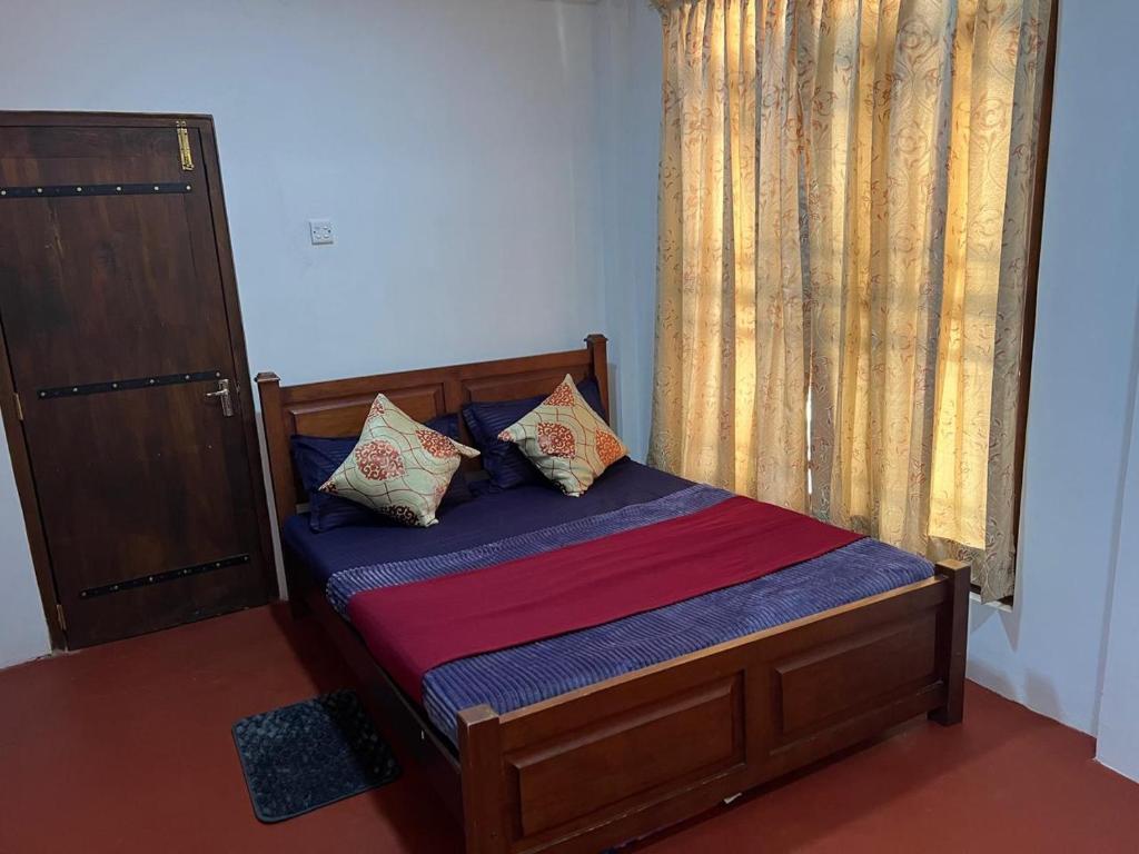 Postel nebo postele na pokoji v ubytování Moban House