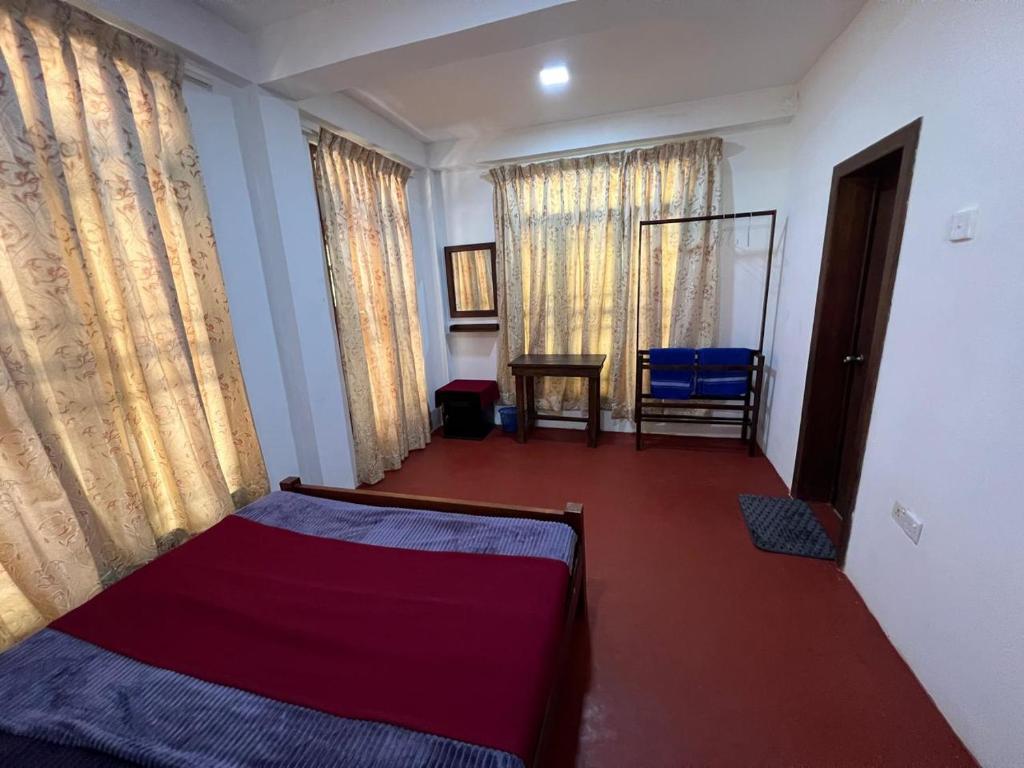 Postel nebo postele na pokoji v ubytování Moban House