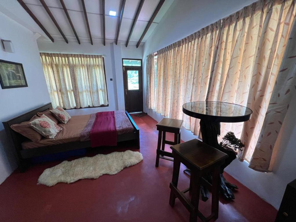 Postel nebo postele na pokoji v ubytování Moban House
